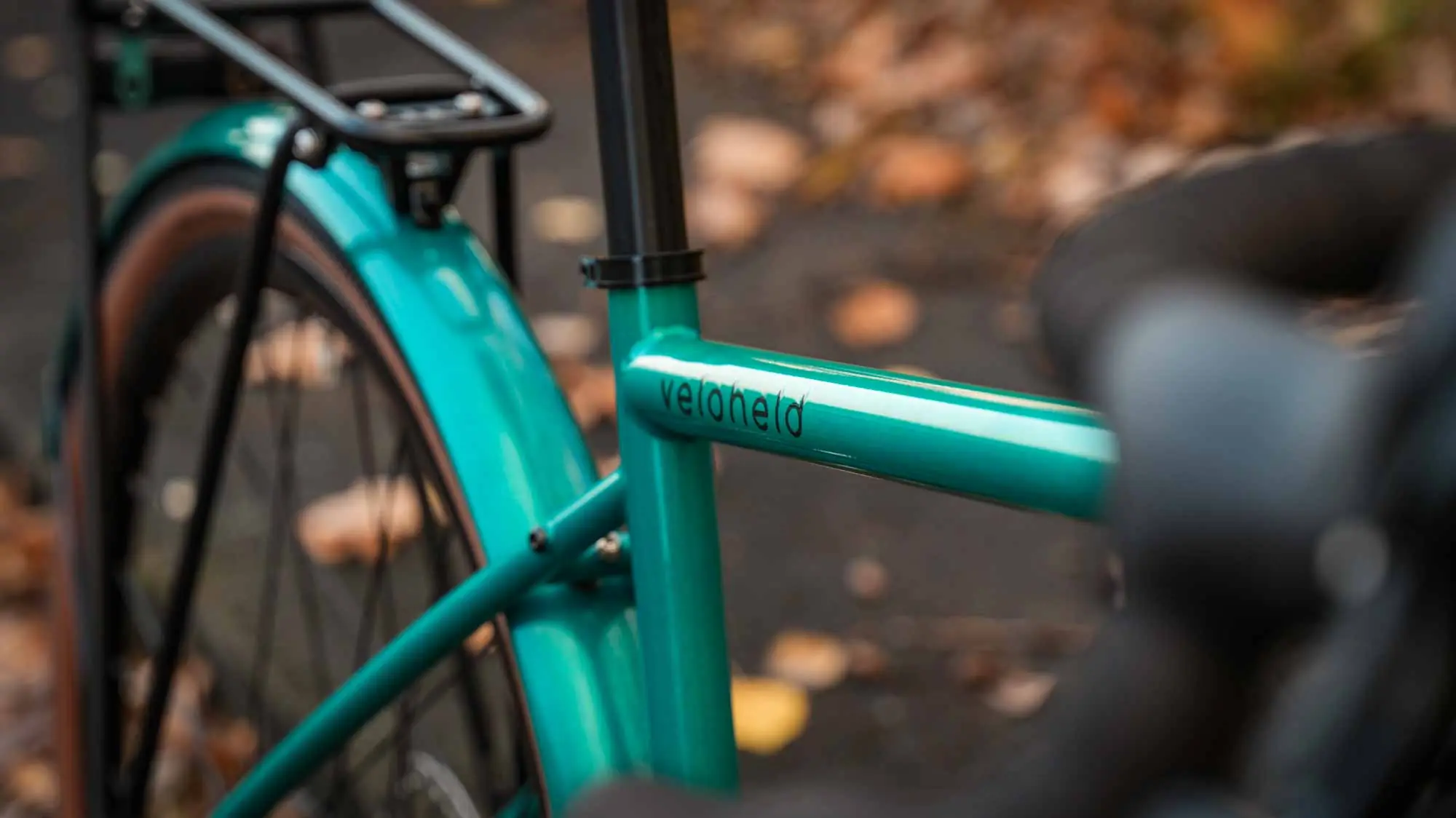 veloheld.allex Tourist in blue-green Detailed view of top tube and rear wheel