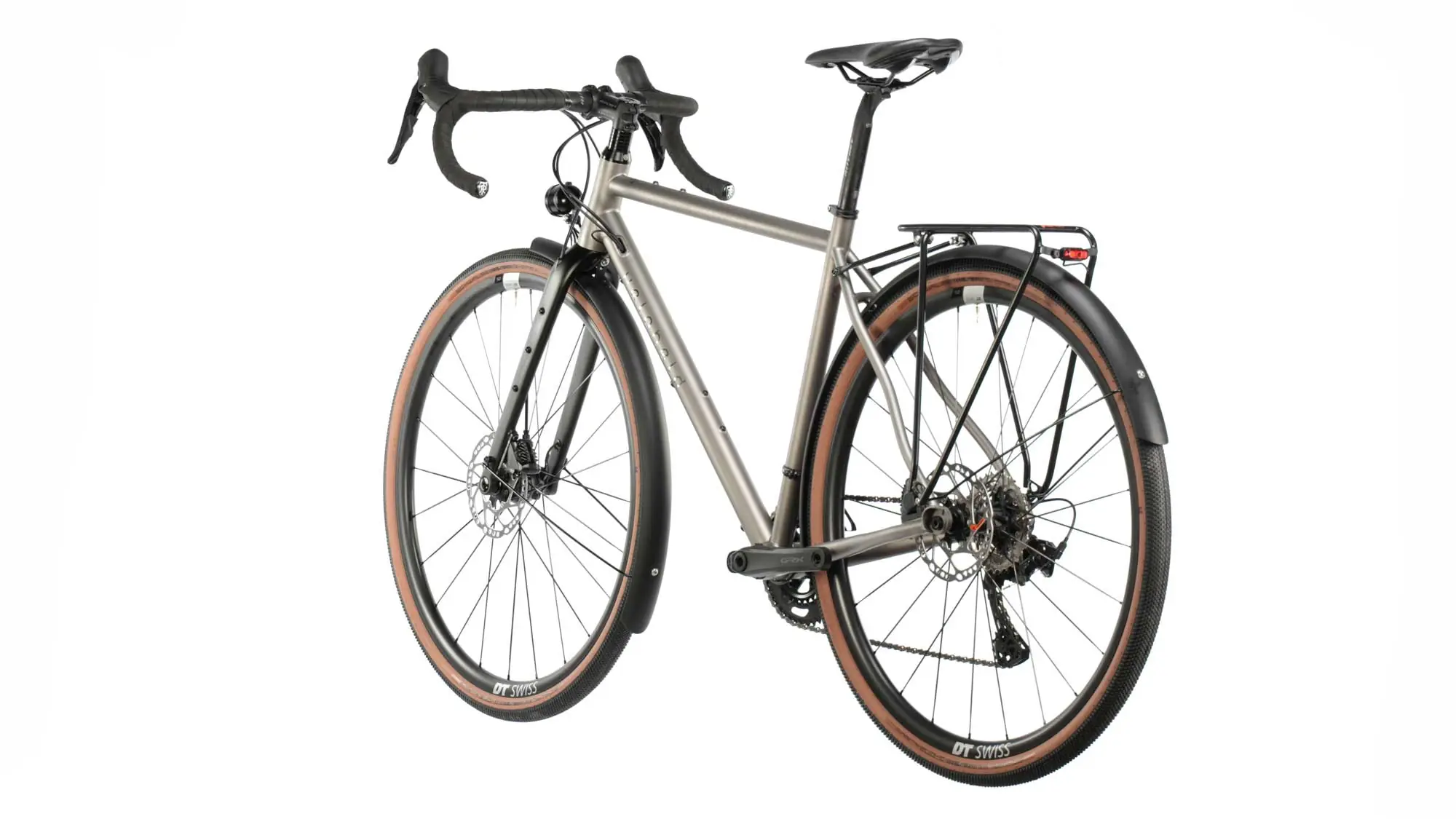 Ein graues veloheld.iconX Titan Tourist, ein Komplettrad mit Schutzblechen und Gepäckträger 